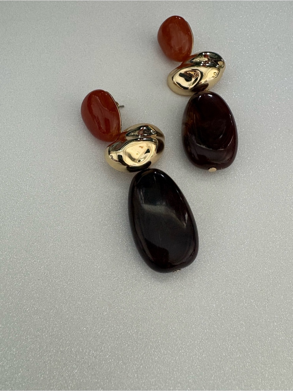 Mango Gold and Dark Brown Drop Earrings with Red Accents